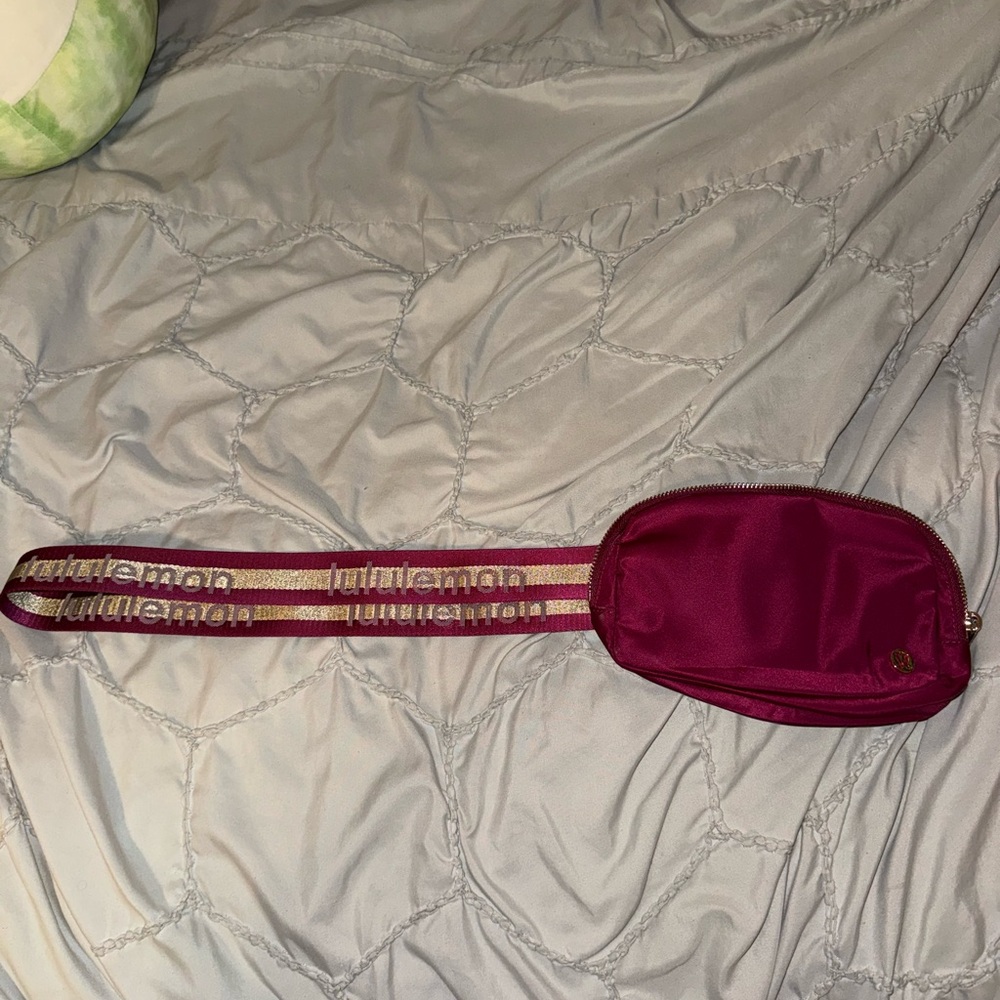 Lululemon belt bag in rich berry pink